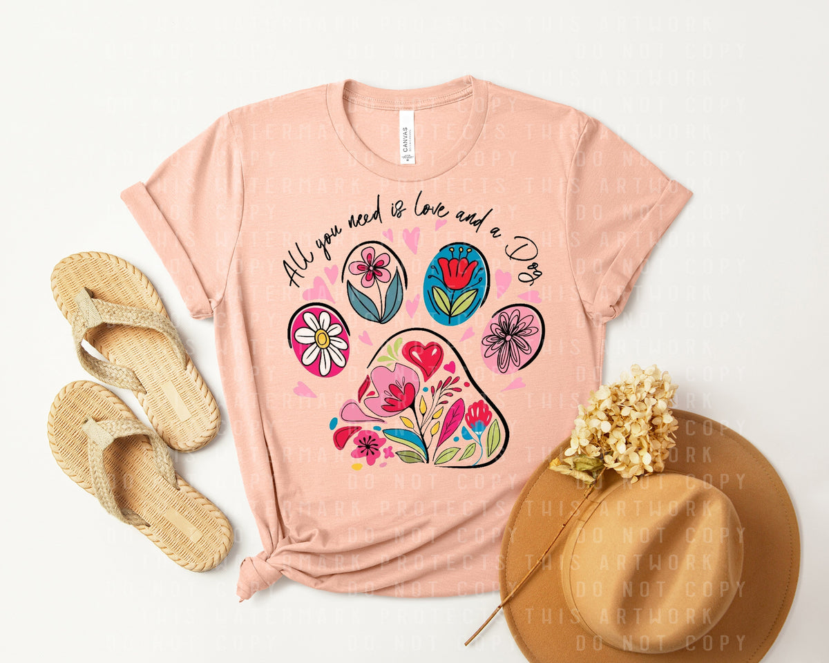 All You Need is Love and a Dog Graphic Tee product image 1